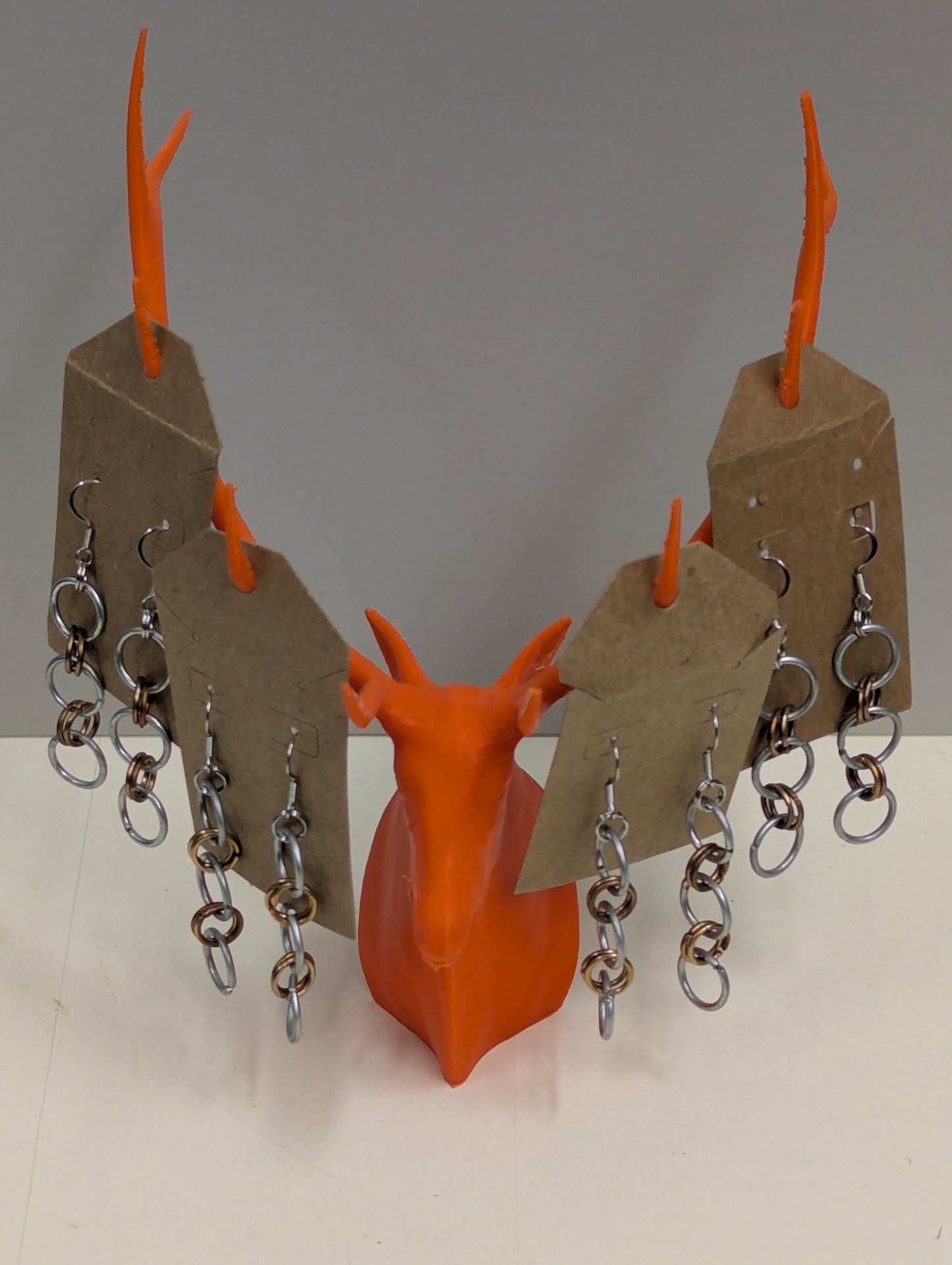 steel and copper hoop earrings