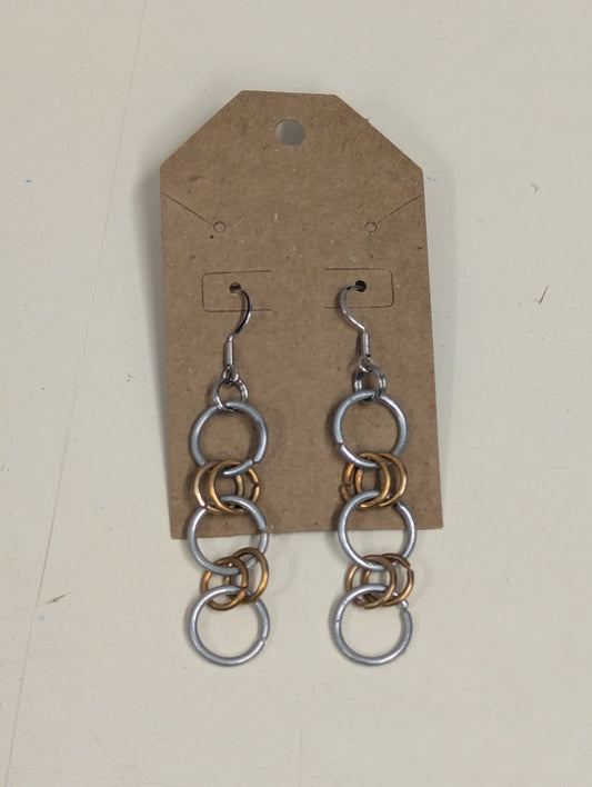 steel and copper hoop earrings