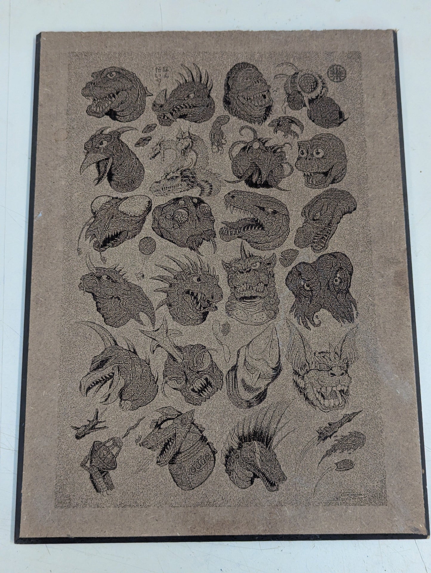 Wood burn Godzilla collage monsters characters heads