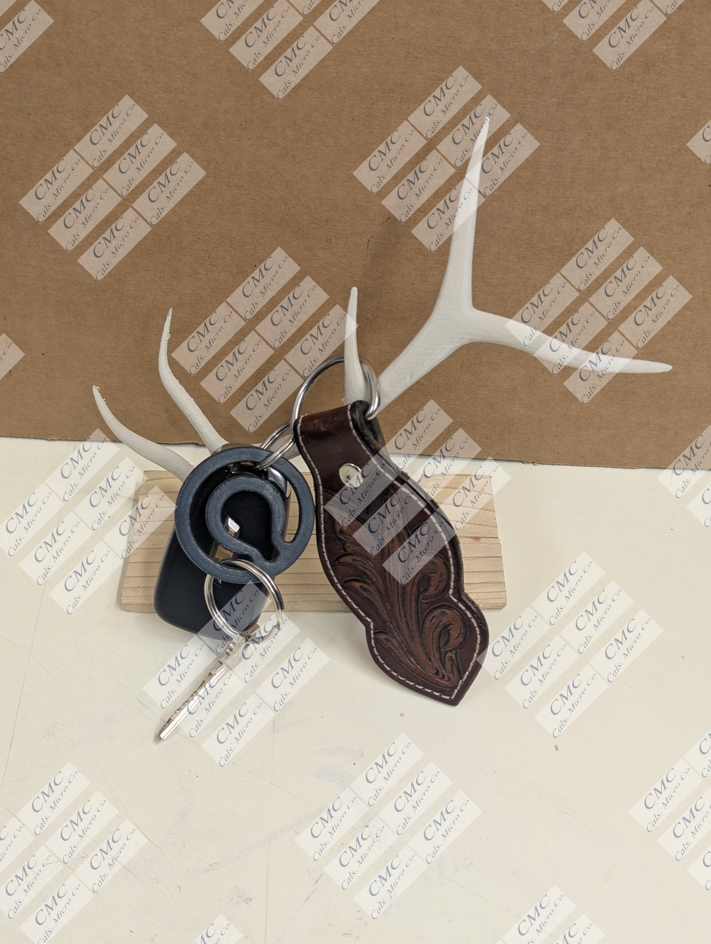 Wood base with cream white antler decor
