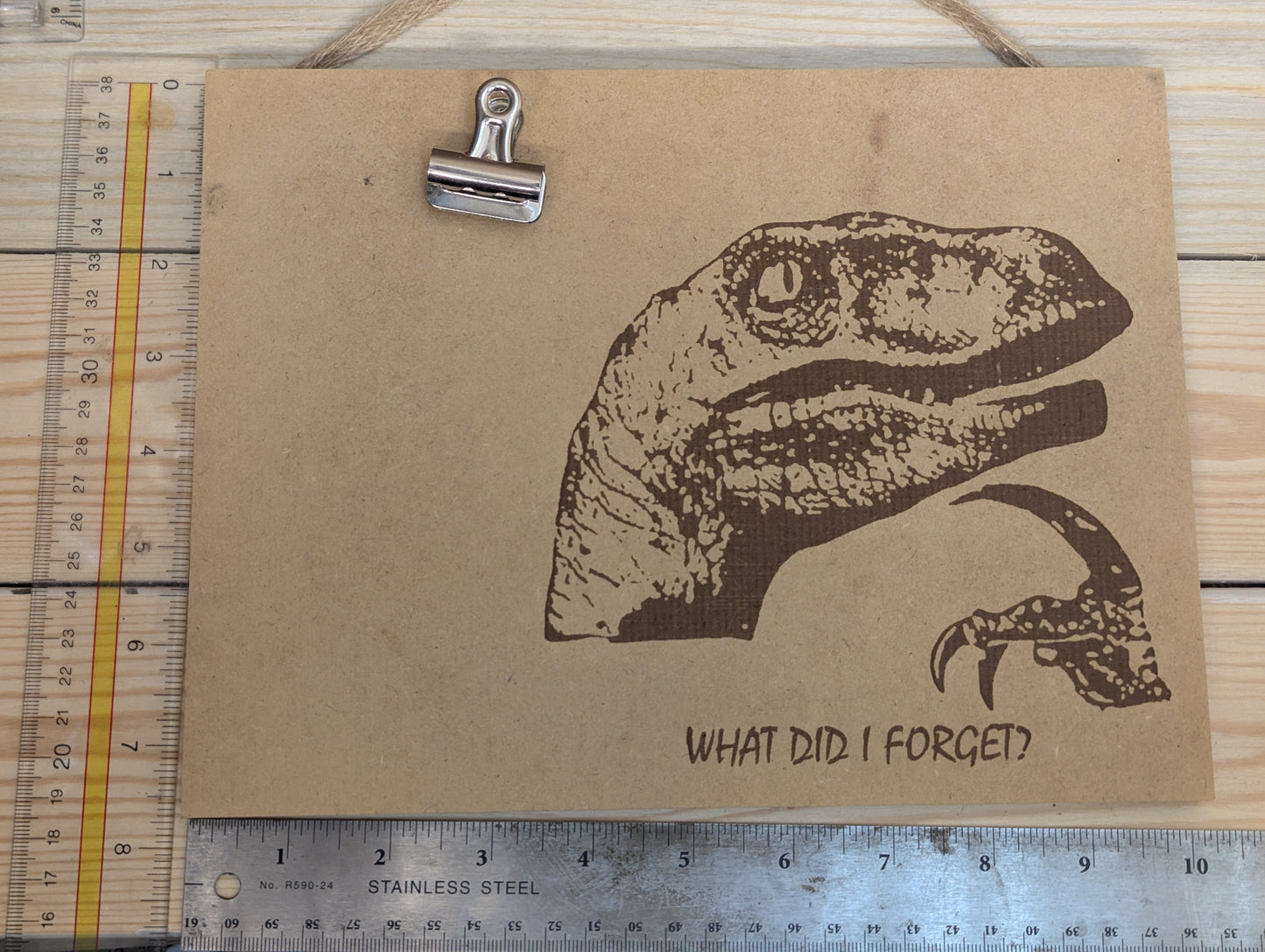 Wood burn raptor meme