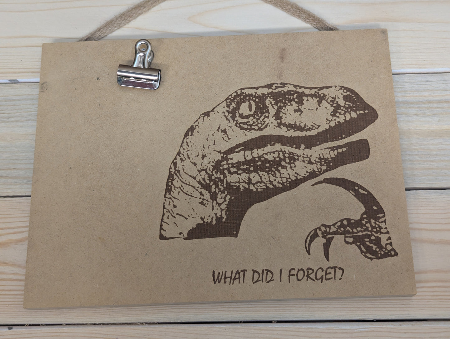 Wood burn raptor meme