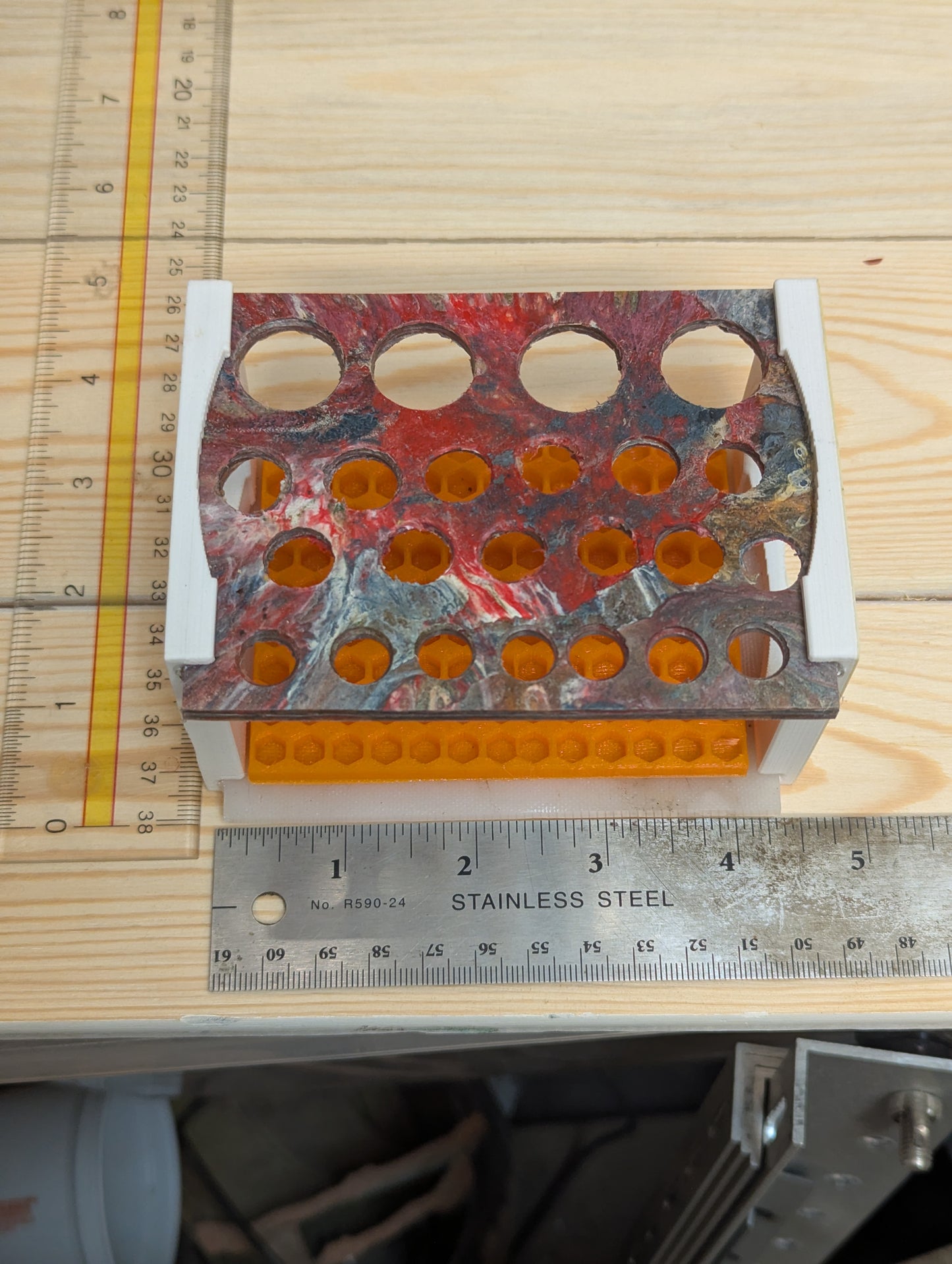 Multi function tool/pen rack