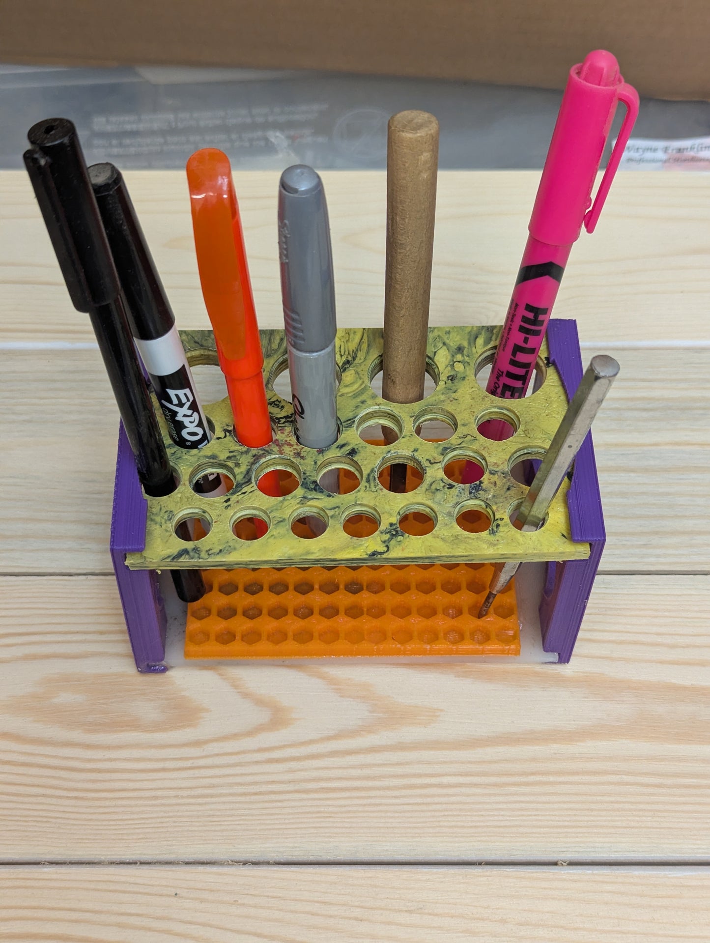 Multi function tool/pen rack