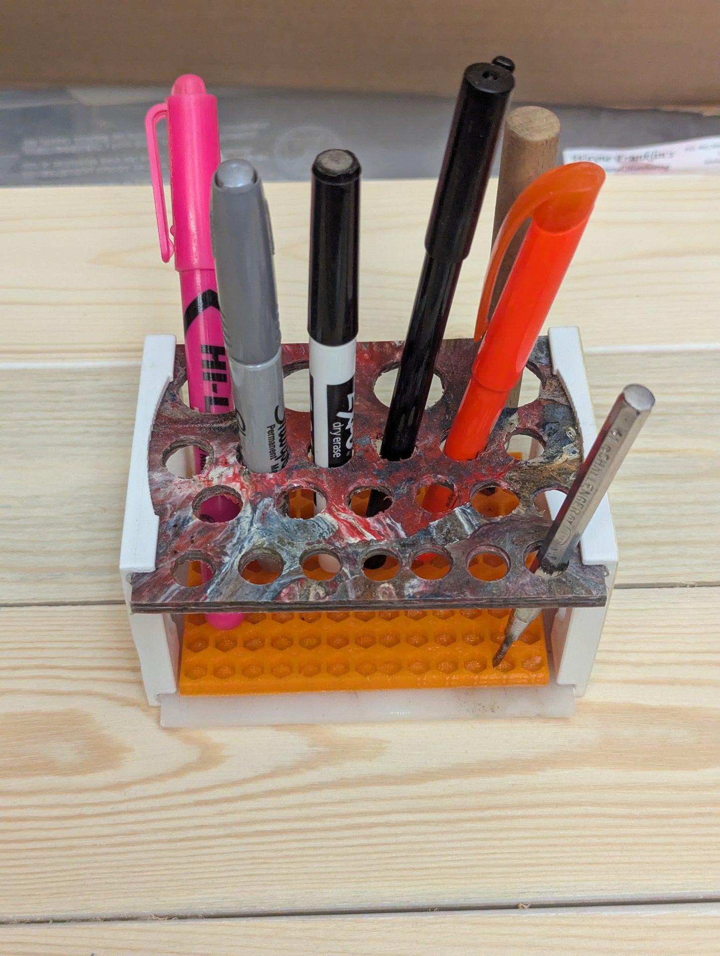 Multi function tool/pen rack