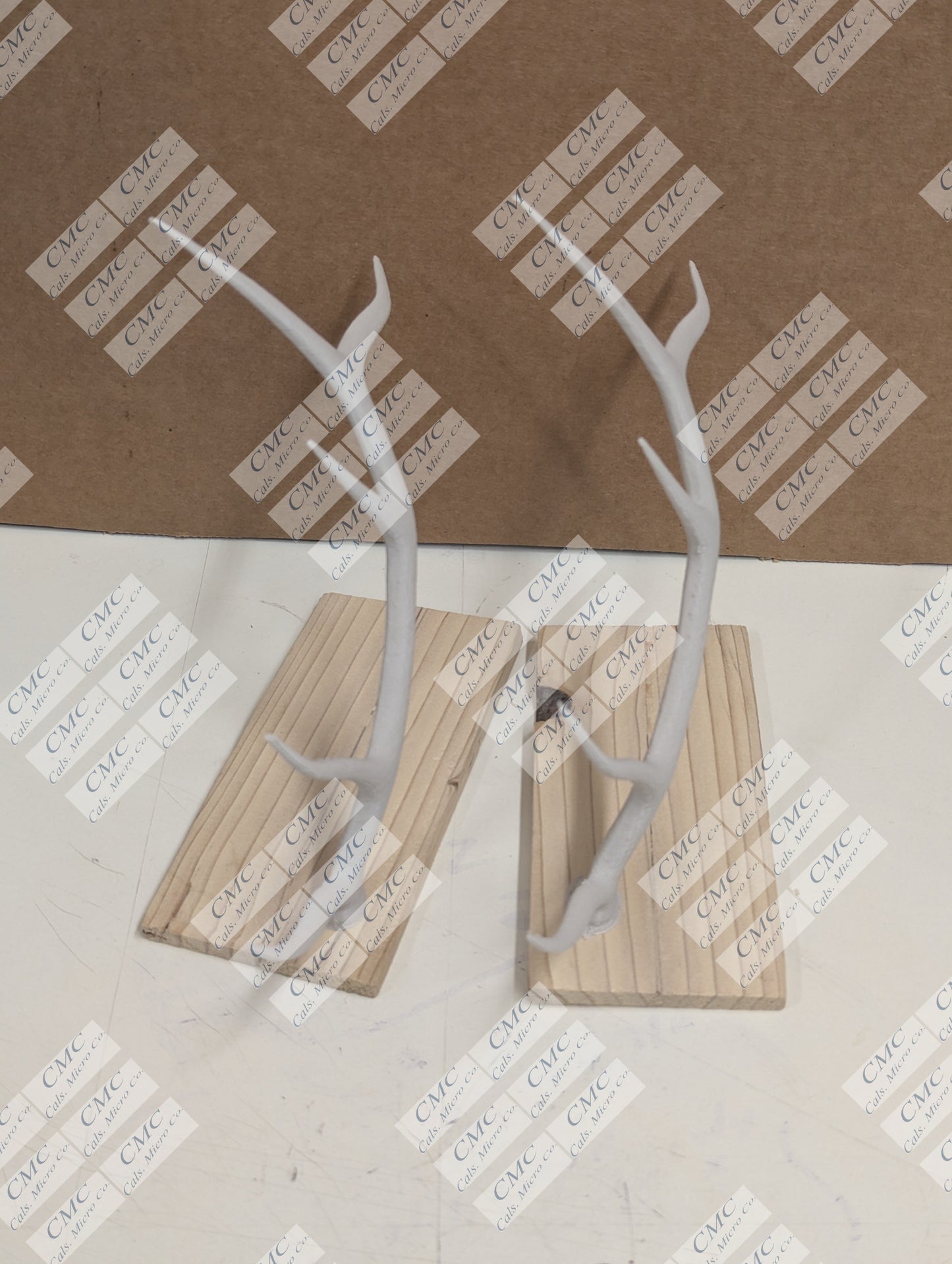 Wood base with cream white antler decor