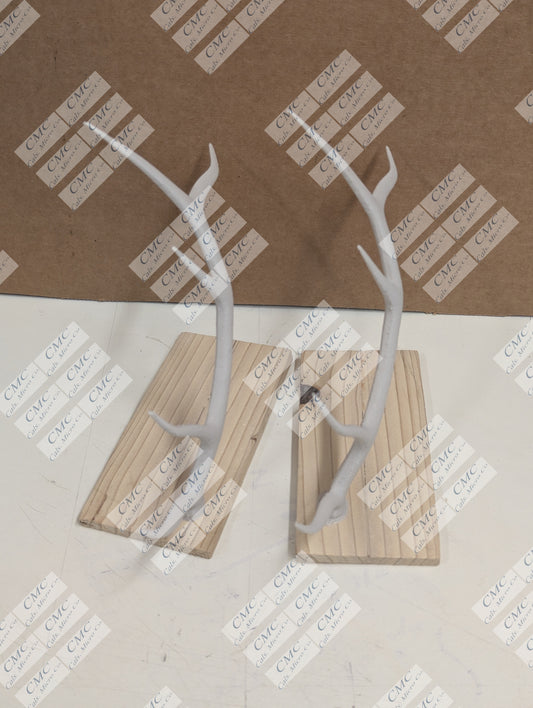 Wood base with cream white antler decor