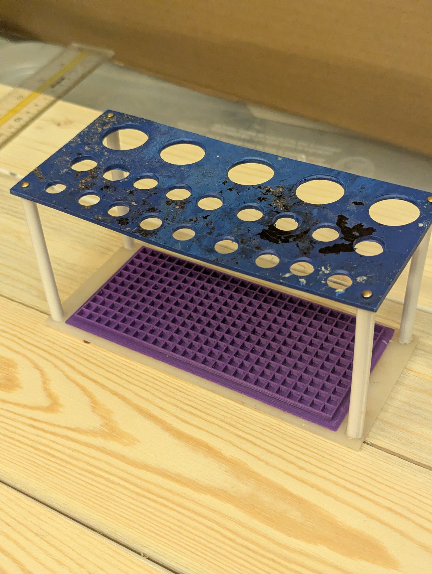 Multi function tool/pen rack