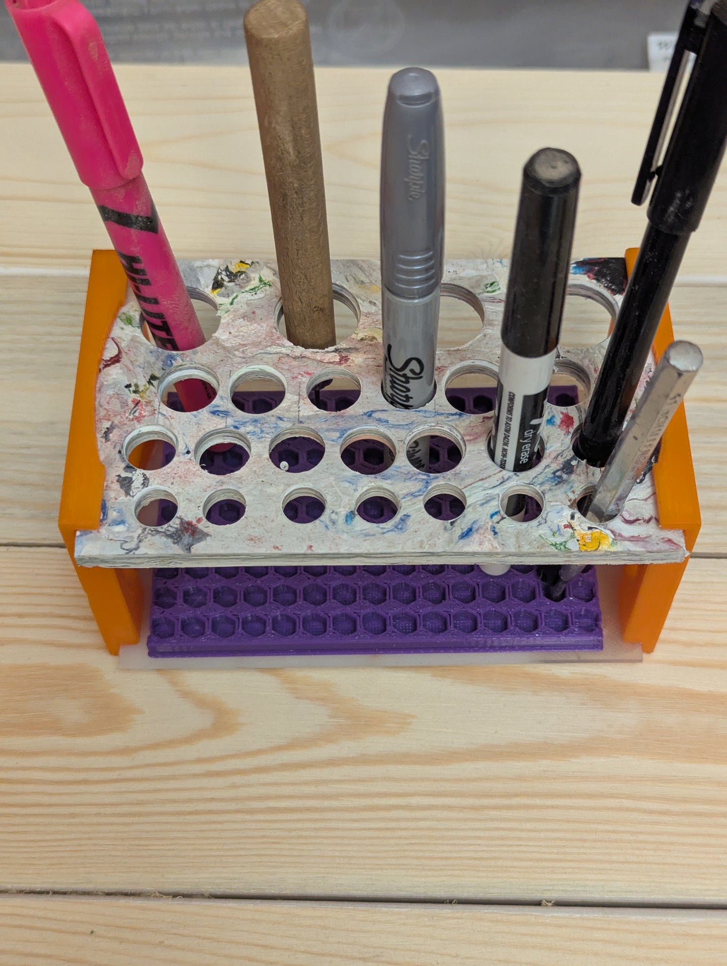 Multi function tool/pen rack