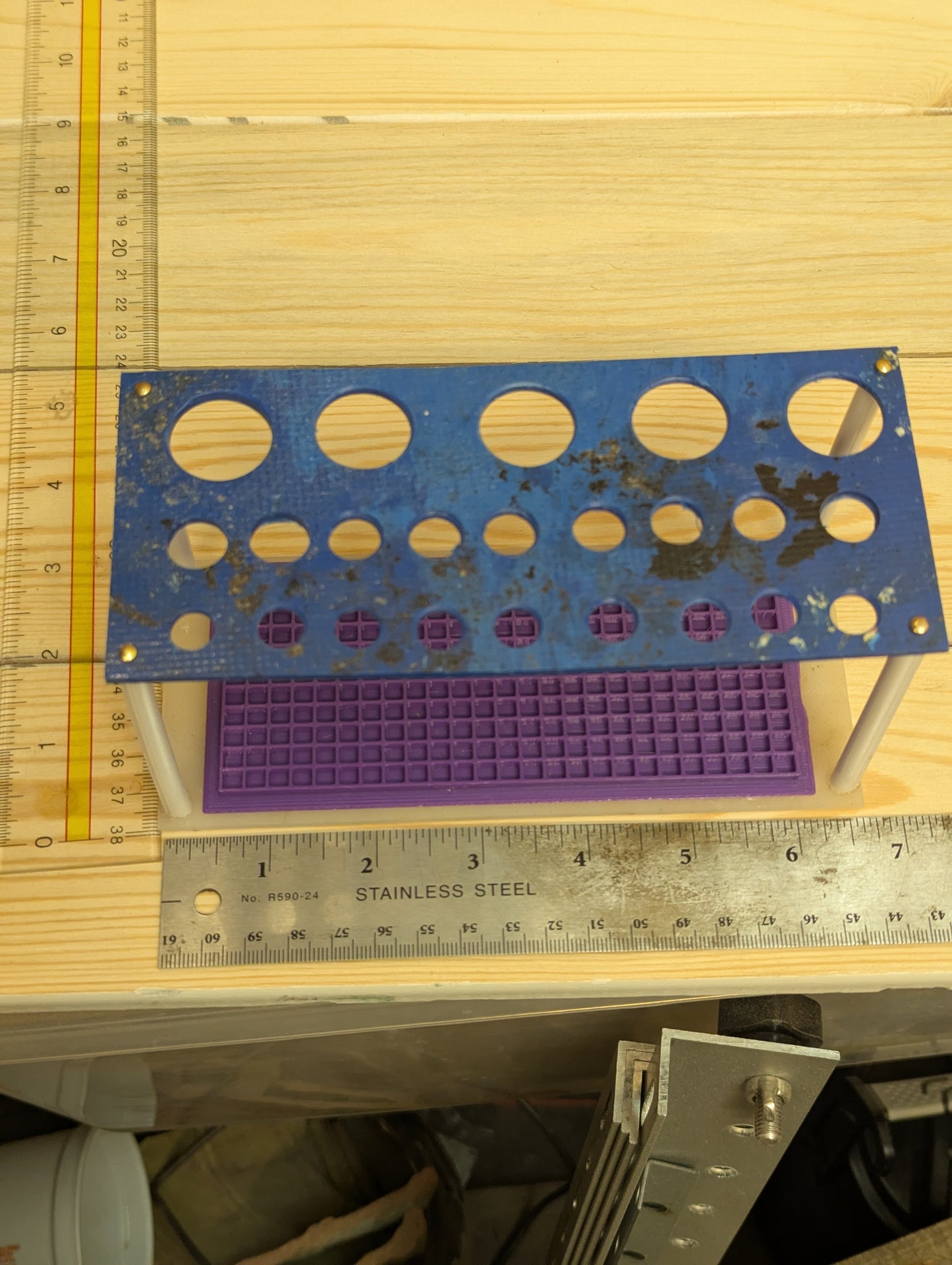 Multi function tool/pen rack